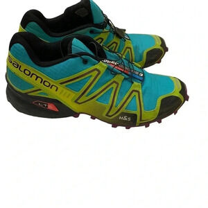 Saloman women’s size 10 sneaker. See pics for wear on bottom.